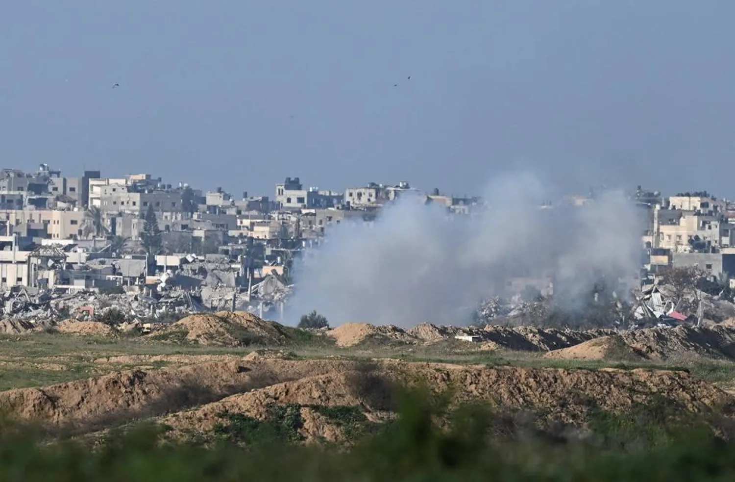  Smoke rises in central Gaza, amid the ongoing conflict between Israel and the Palestinian group Hamas, near the Israel-Gaza border, as seen from Israel, February 14, 2024. (Reuters)
