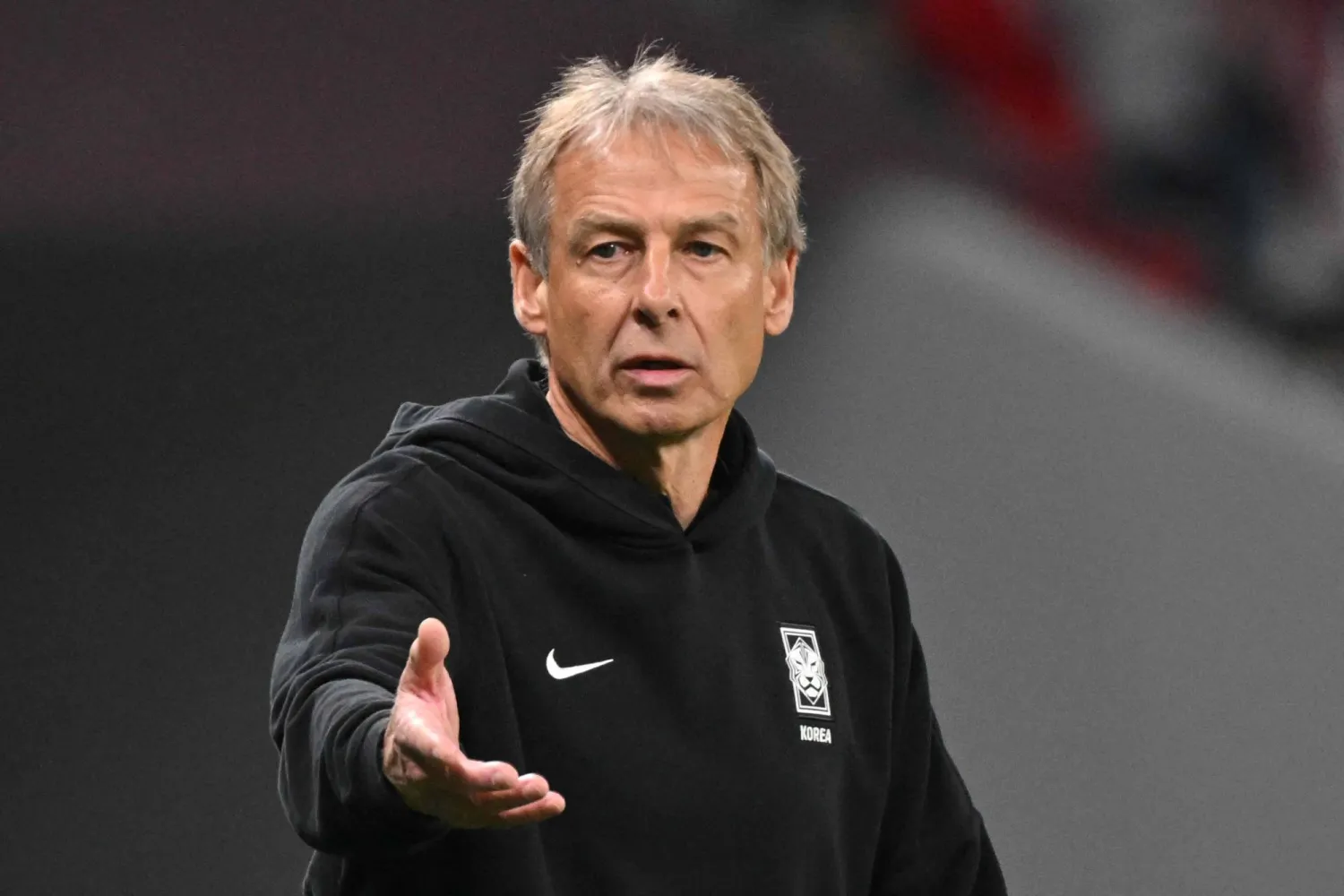 (FILES) South Korea's German coach Jurgen Klinsmann gives instructions during the Qatar 2023 AFC Asian Cup semi-final football match between Jordan and South Korea at the Ahmad Bin Ali Stadium in Al-Rayyan, west of Doha on February 6, 2024. (Photo by Hector RETAMAL / AFP)
