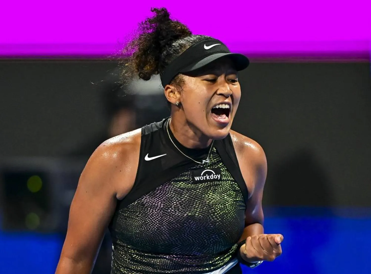 Naomi Osaka of Japan in action against Karolina Pliskova of the Czech Republic during their quarter-final match at the WTA Qatar Open Tennis tournament at the Khalifa International Tennis Complex in Doha, Qatar, 15 February 2024. (EPA)