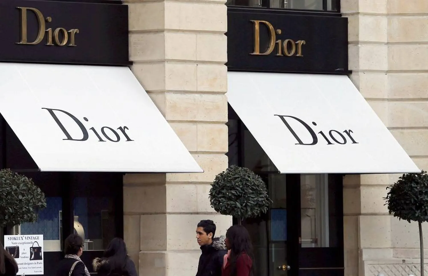 Logos of Dior brand are seen outside a Dior store in Paris, France, March 3, 2017. (Reuters)