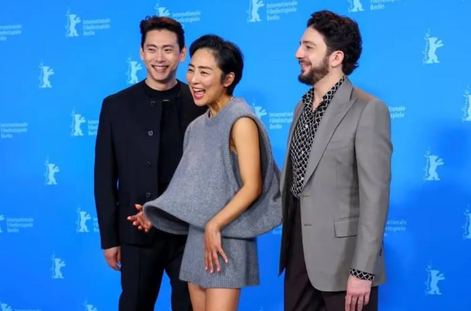 Cast members Greta Lee, John Magaro and Teo Yoo attend a photo call to promote the movie 'Past Lives' at the 73rd Berlinale International Film Festival in Berlin, Germany, February 19, 2023. REUTERS/Fabrizio Bensch/File Photo