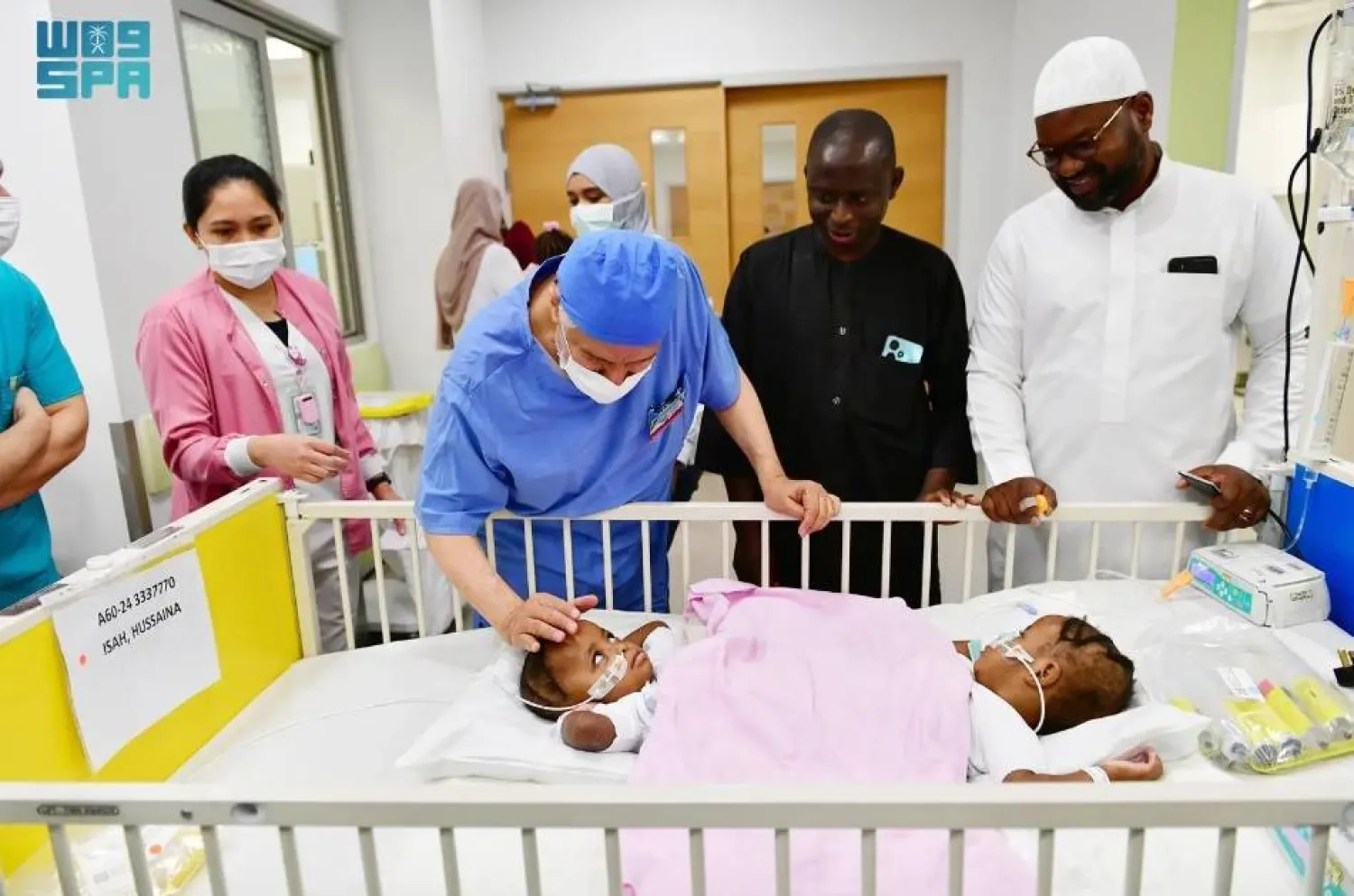 The twins share areas in the lower abdomen, pelvis, lower spine, and lower spinal nerves. SPA