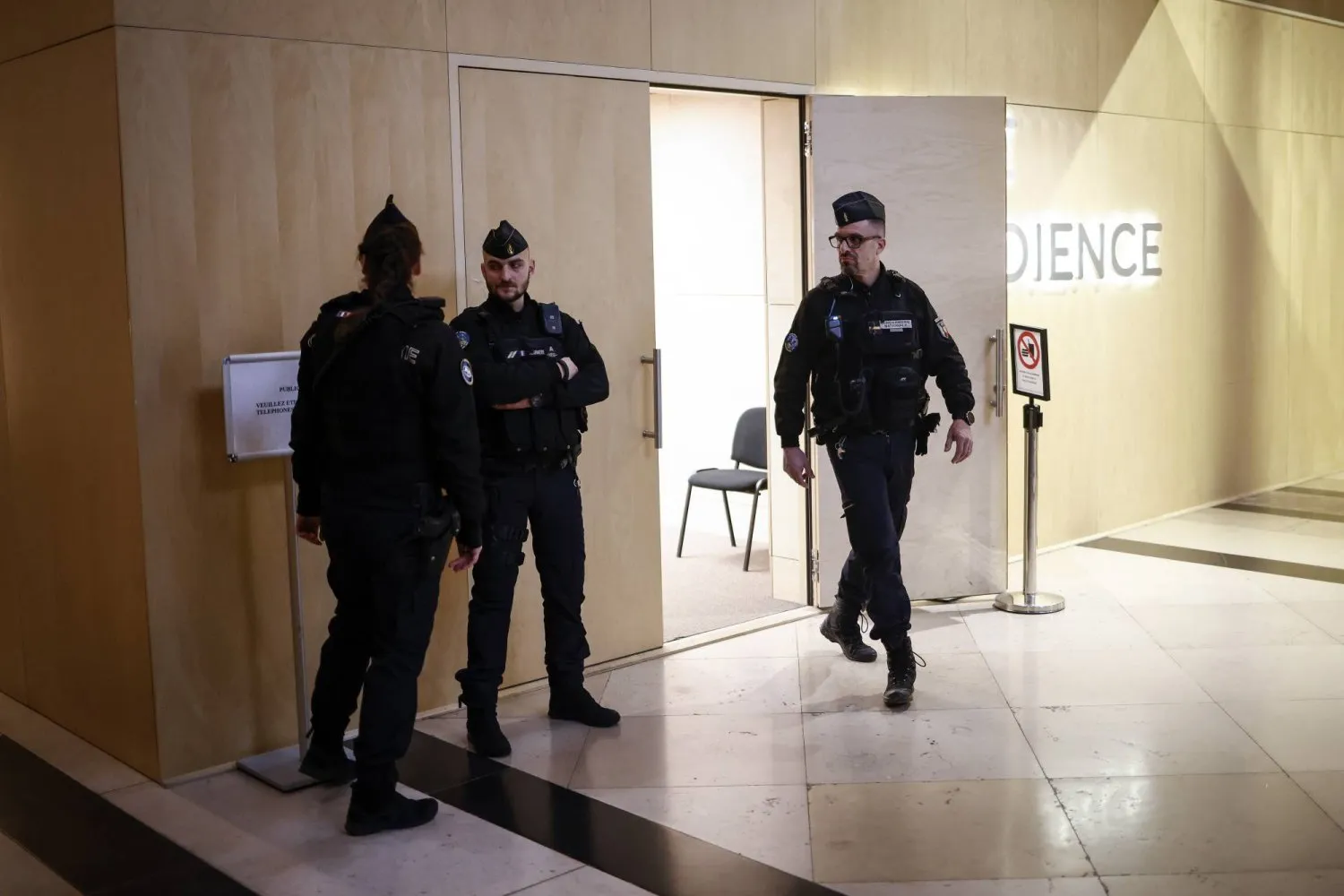 Police forces stand guard next to the Paris criminal court for the beginning of the trial over the terror attack at the Strasbourg Christmas market in December 2018, in Paris, France, 29 February 2024 (EPA)