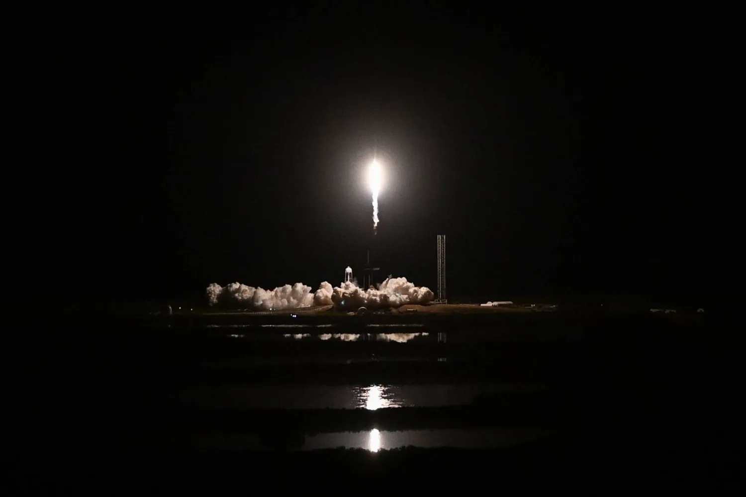 A SpaceX Falcon 9 rocket with the Crew Dragon Endeavour capsule carrying the Crew-8 mission launches from launch pad 39A at NASA's Kennedy Space Center in Florida on March 3, 2024. (Photo by CHANDAN KHANNA / AFP)