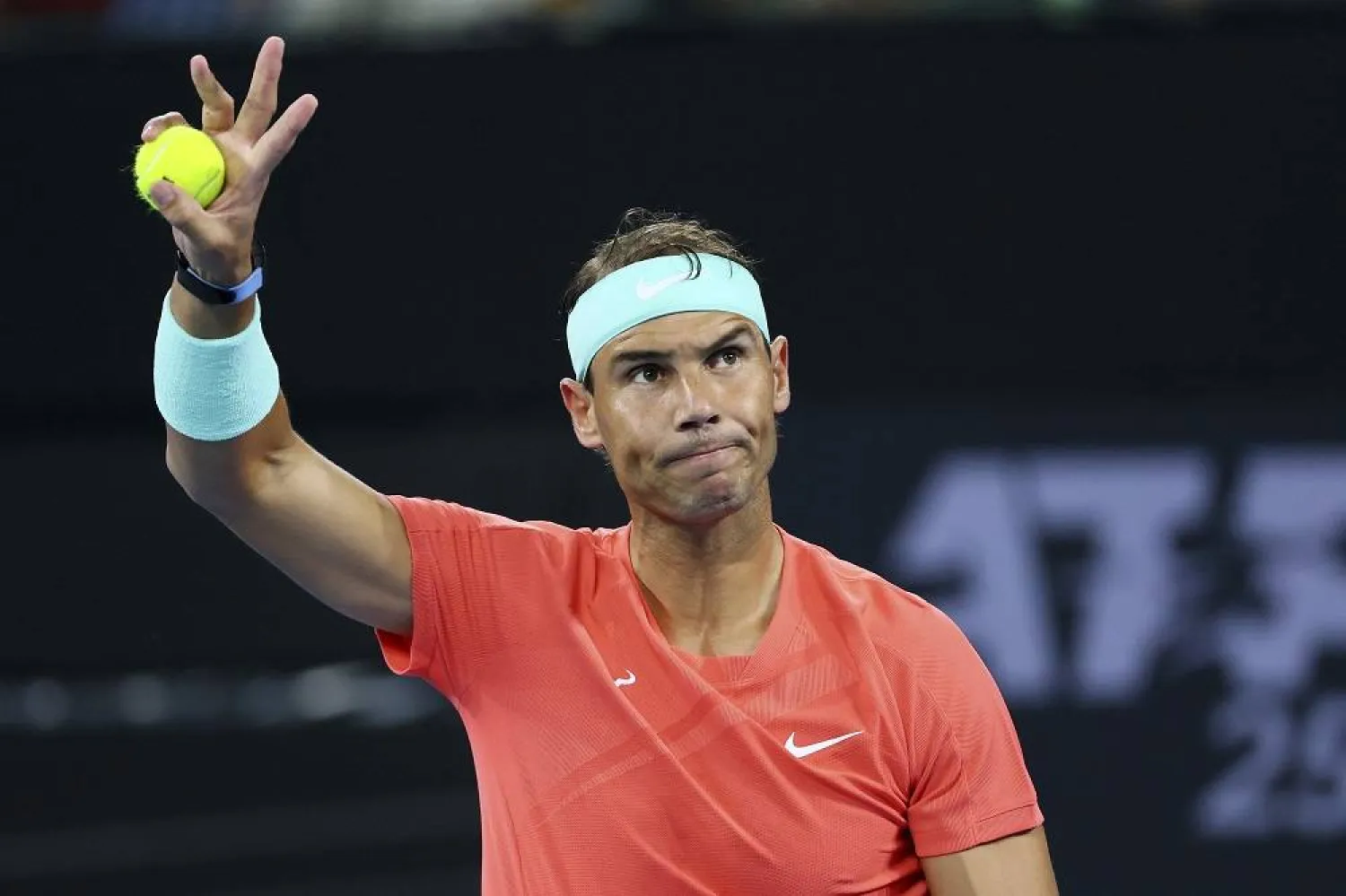 Rafael Nadal of Spain waves to the crowd in his match against Dominic Thiem of Austria during the Brisbane International tennis tournament in Brisbane, Australia, Tuesday, Jan. 2, 2024. (AP)