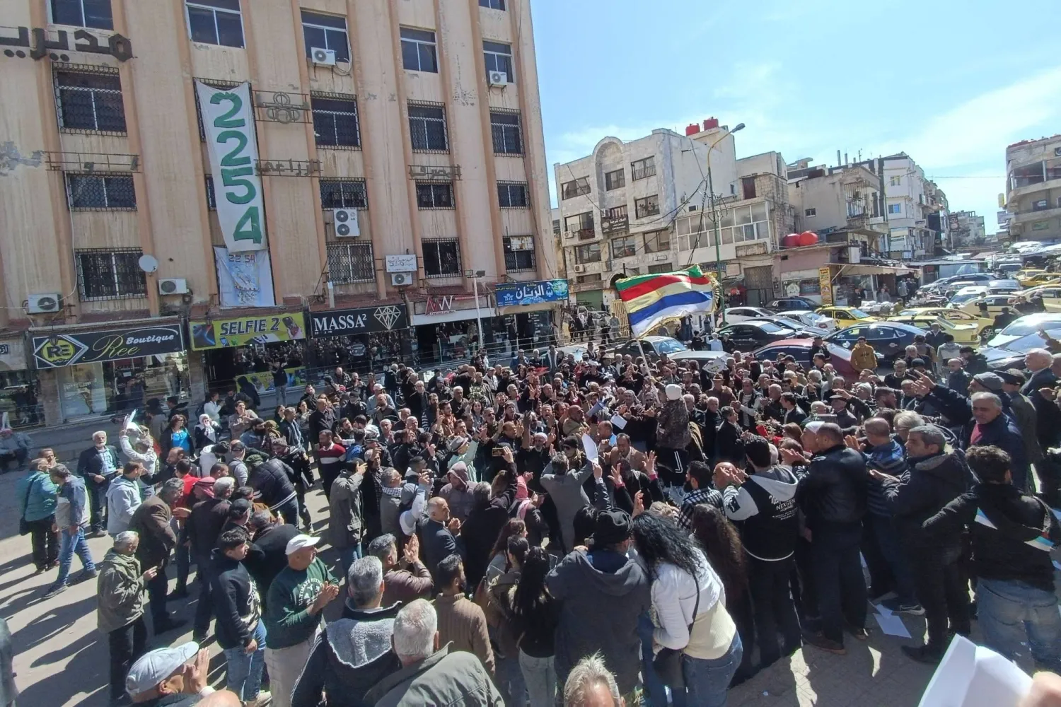 File photo: A handout picture released by the Suwayda 24 news site shows people protesting in the southern Syrian city of Sweida on February 28, 2024. (Photo by SUWAYDA24 / AFP)
