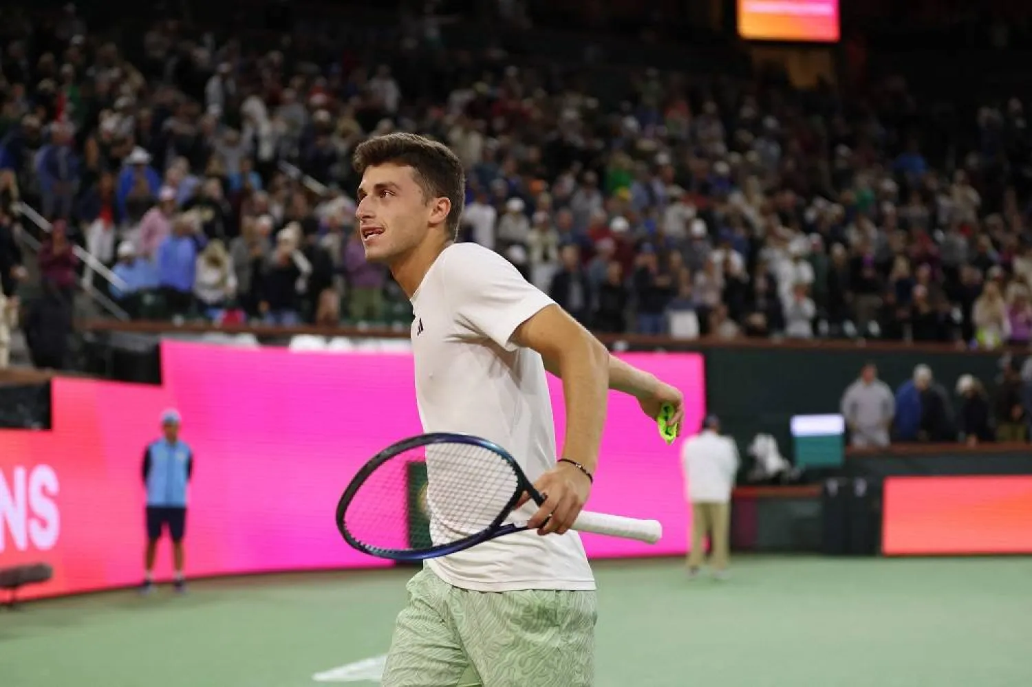 Luca Nardi of Italy celebrates to the crowd after his three set victory against Novak Djokovic of Serbia in their third round match during the BNP Paribas Open at Indian Wells Tennis Garden on March 11, 2024 in Indian Wells, California. (Getty Images/AFP)