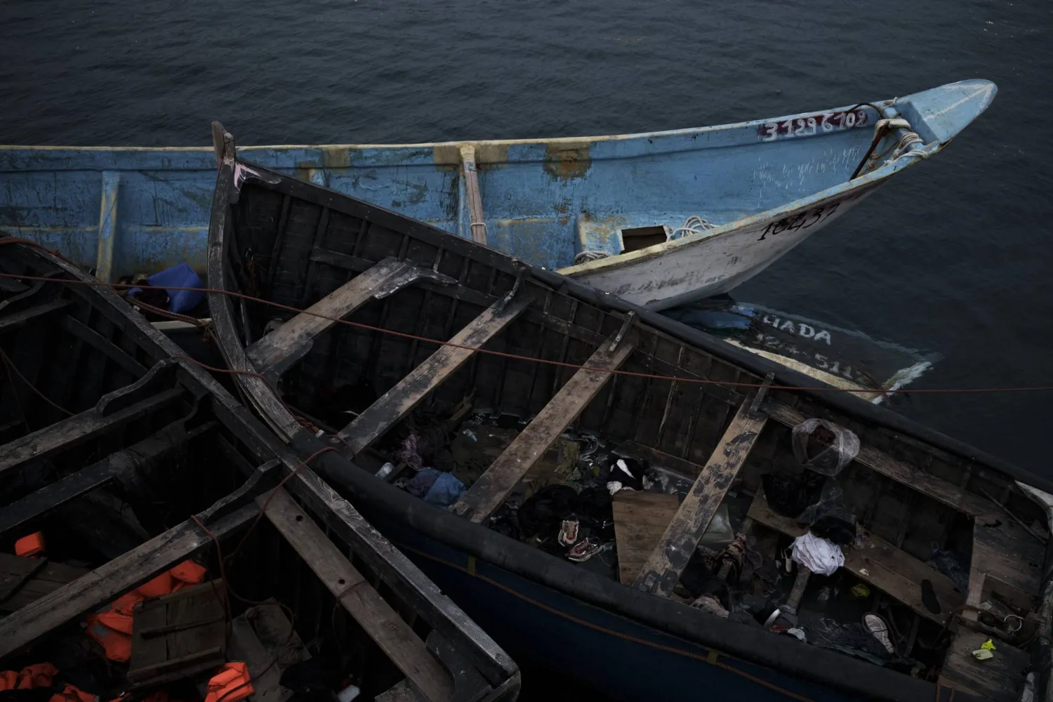 FILE - Empty boats used by migrants are moored at the port of Arguineguin in the Canary island of Gran Canaria, Spain, on Nov. 21, 2021. (AP Photo/Felipe Dana)