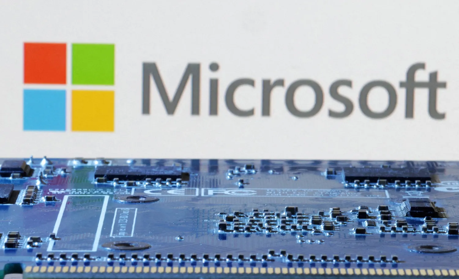 FILE PHOTO: Microsoft logo is seen near computer motherboard in this illustration taken January 8, 2024. REUTERS/Dado Ruvic/Illustration/File Photo