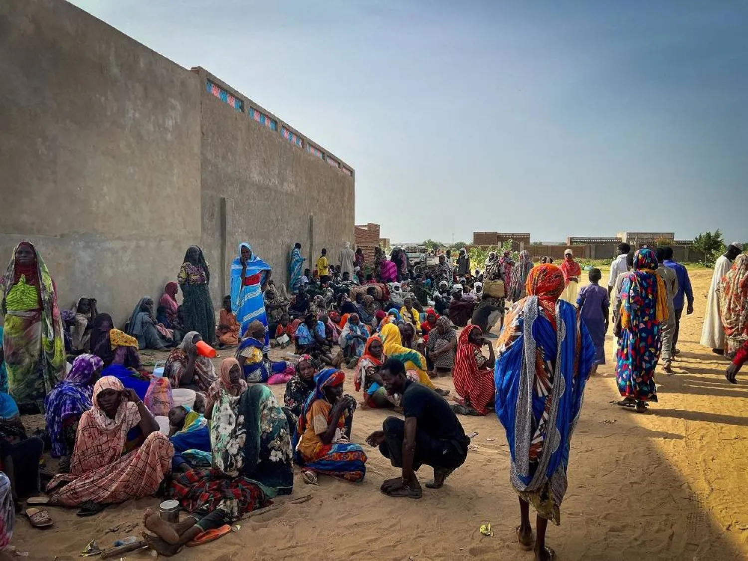 Sudanese refugees gather as Doctors Without Borders (MSF) teams assist the war-wounded from West Darfur, Sudan, in Adre hospital, Chad, June 16, 2023 in this handout image. (Courtesy of Mohammad Ghannam/MSF/Handout via Reuters)