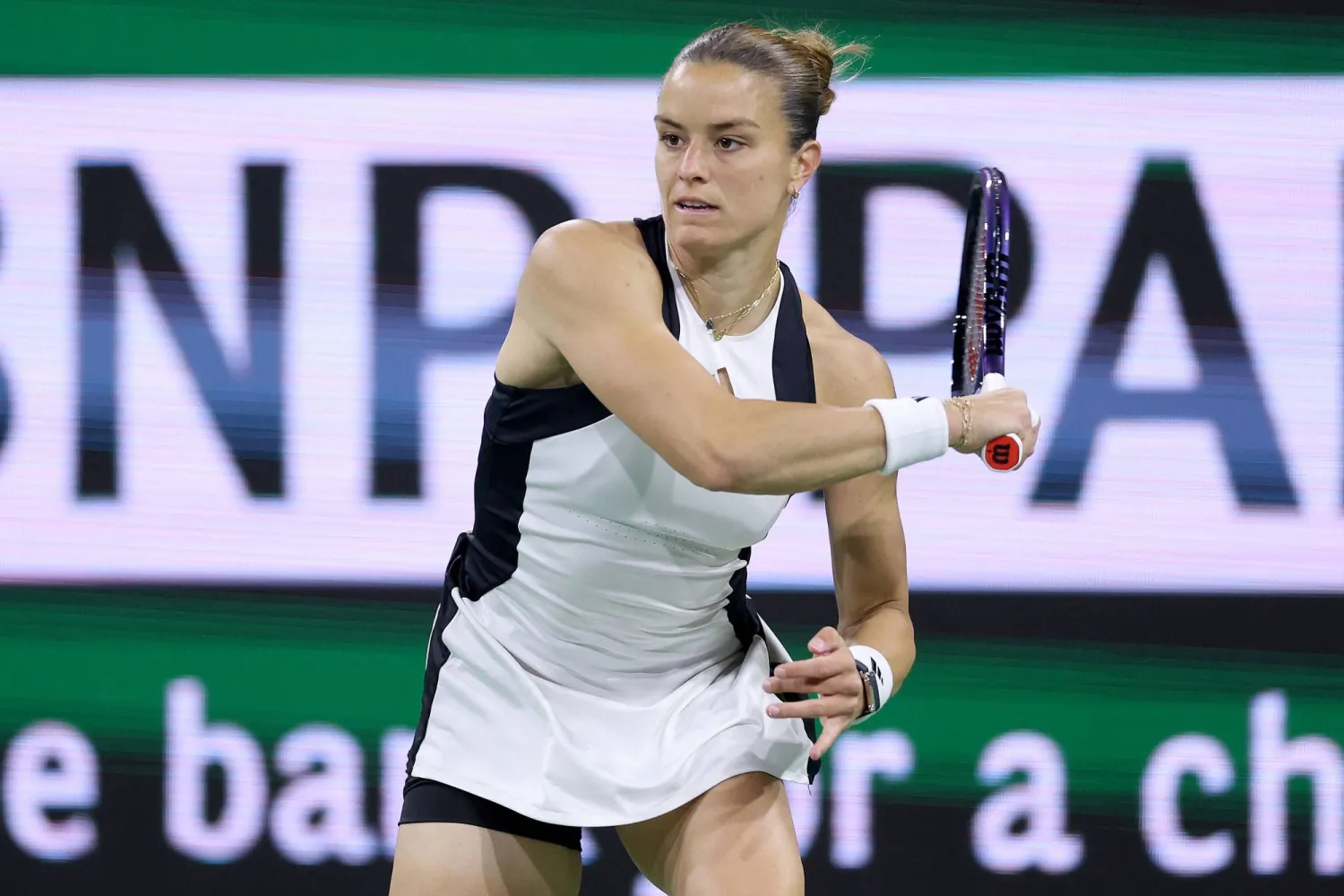 INDIAN WELLS, CALIFORNIA - MARCH 15: Maria Sakkari of Greece returns a shot to Coco Gauff of the United States during the Women's Semifinals of the BNP Paribas Open at Indian Wells Tennis Garden on March 15, 2024 in Indian Wells, California.   Matthew Stockman/Getty Images/AFP