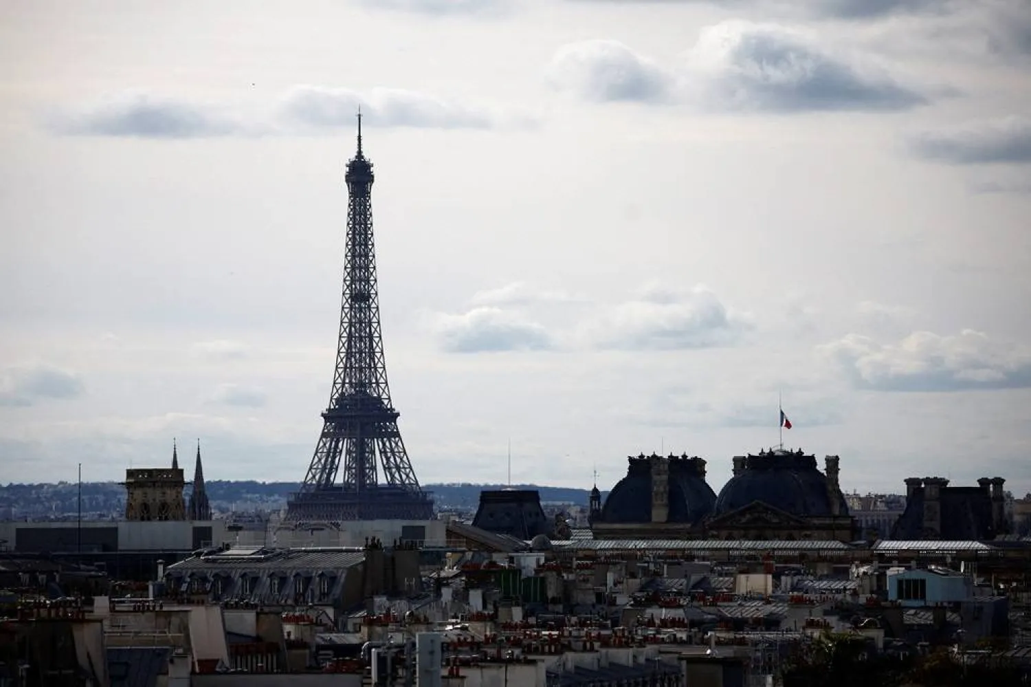  A view shows the Eiffel Tower and rooftops of Paris, France, March 16, 2024. (Reuters)