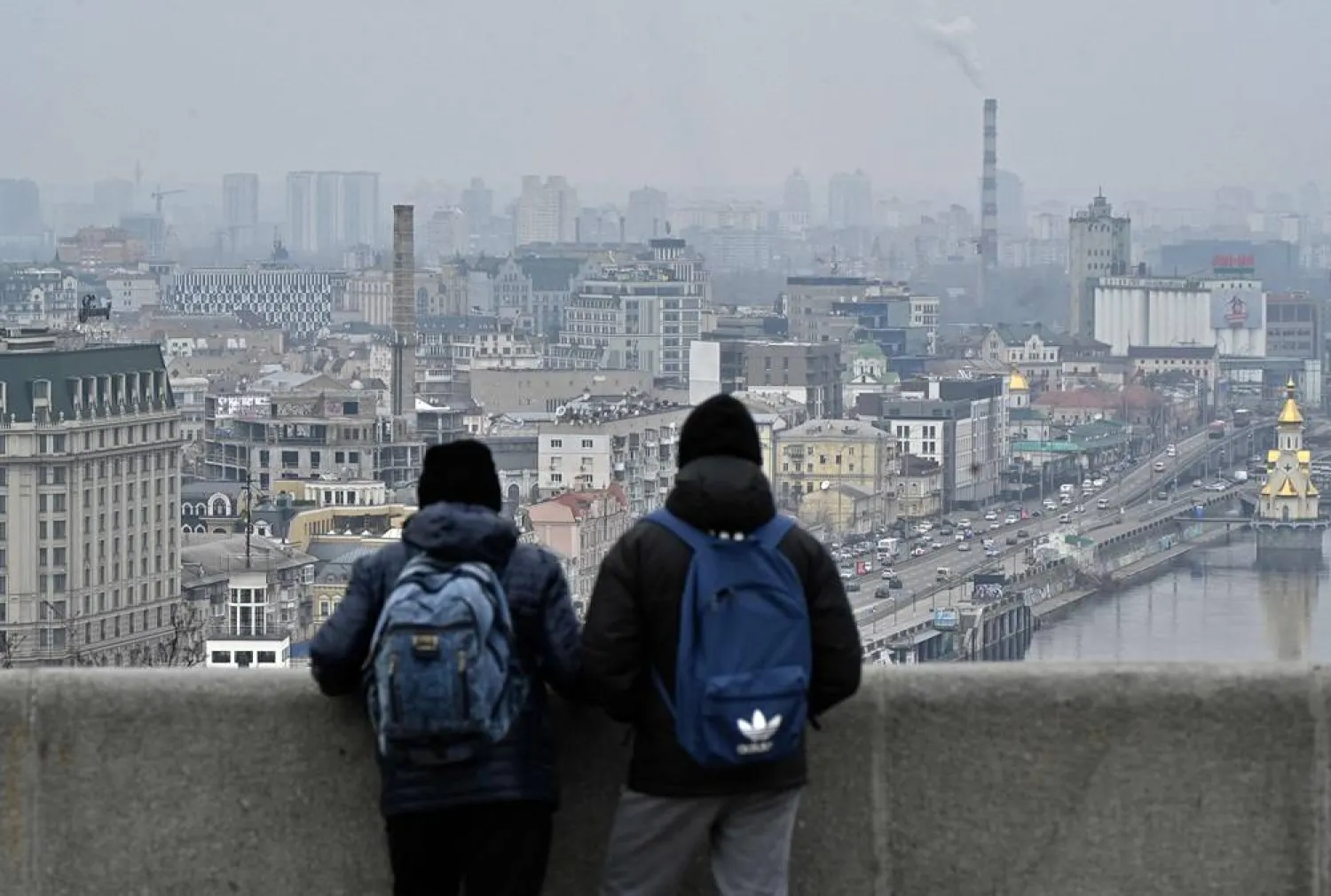  People look at Kyiv's panorama from a park in central Kyiv on March 15, 2024, amid the Russian invasion of Ukraine. (AFP)