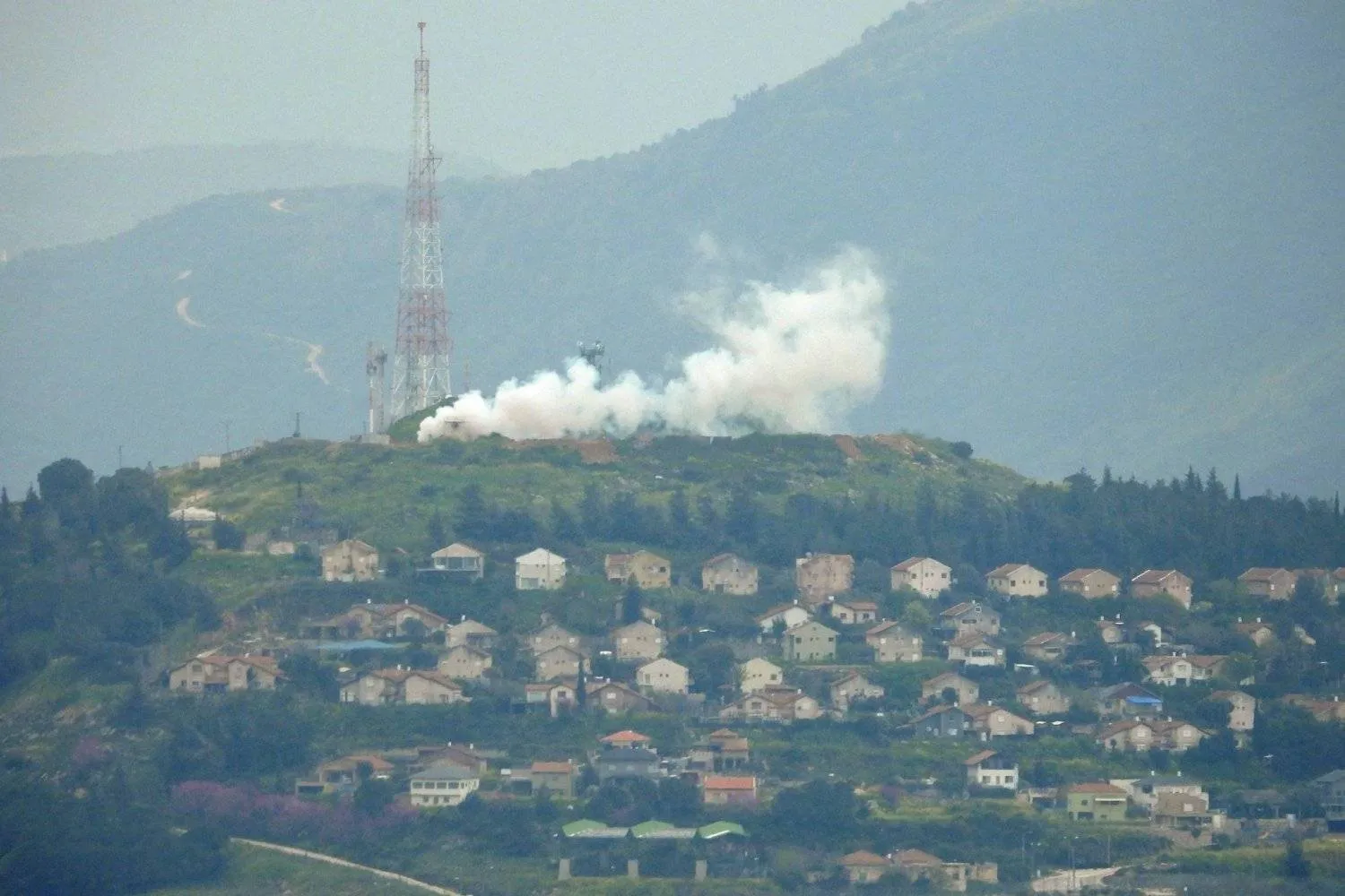 Smoke rises from Metula as a result of an attack carried out by Hezbollah from southern Lebanon. (AFP) 