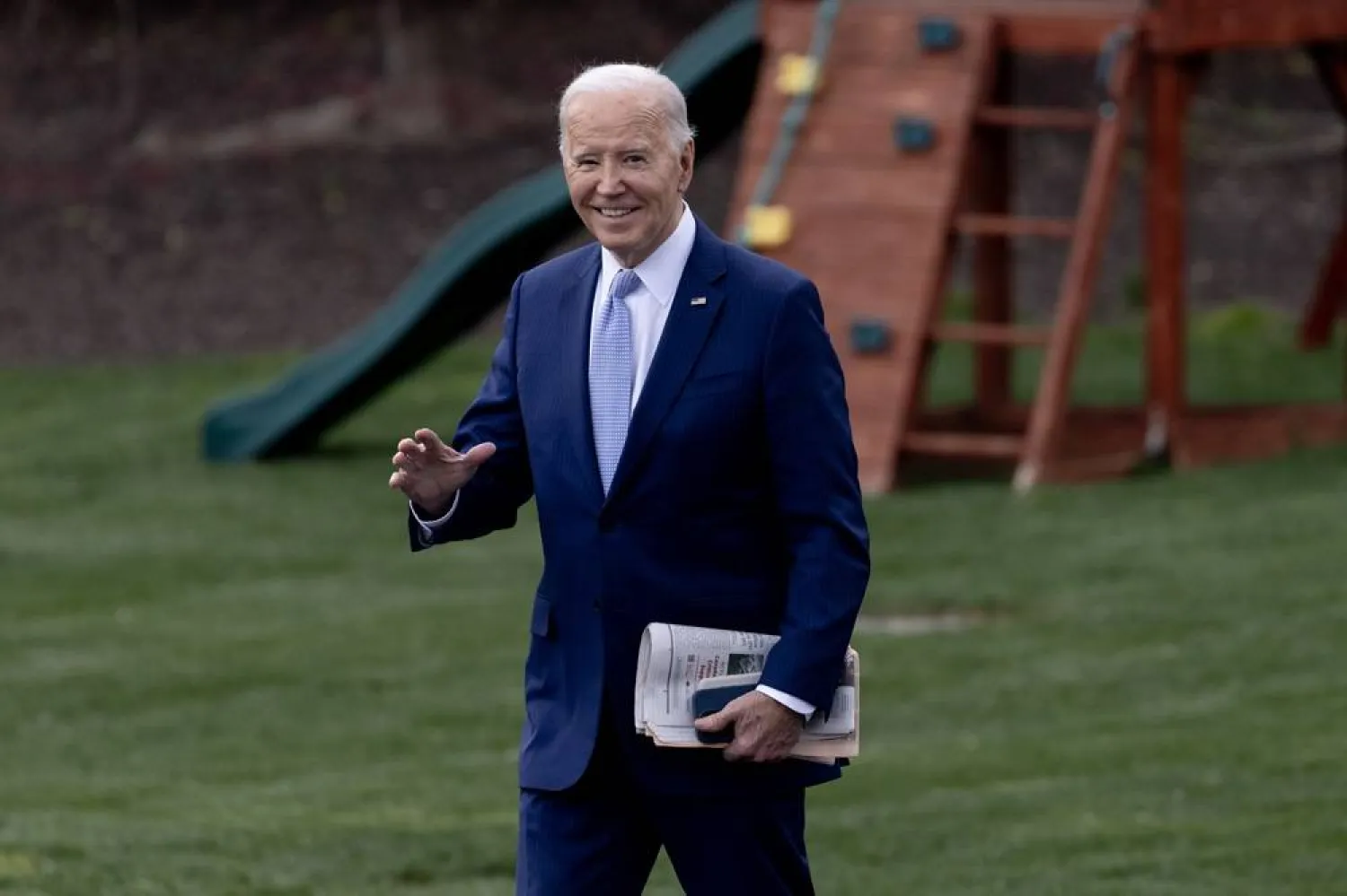 US President Joe Biden walks on the South Lawn of the White House to depart by Marine One, in Washington, DC, USA, 22 March 2024. (EPA)
