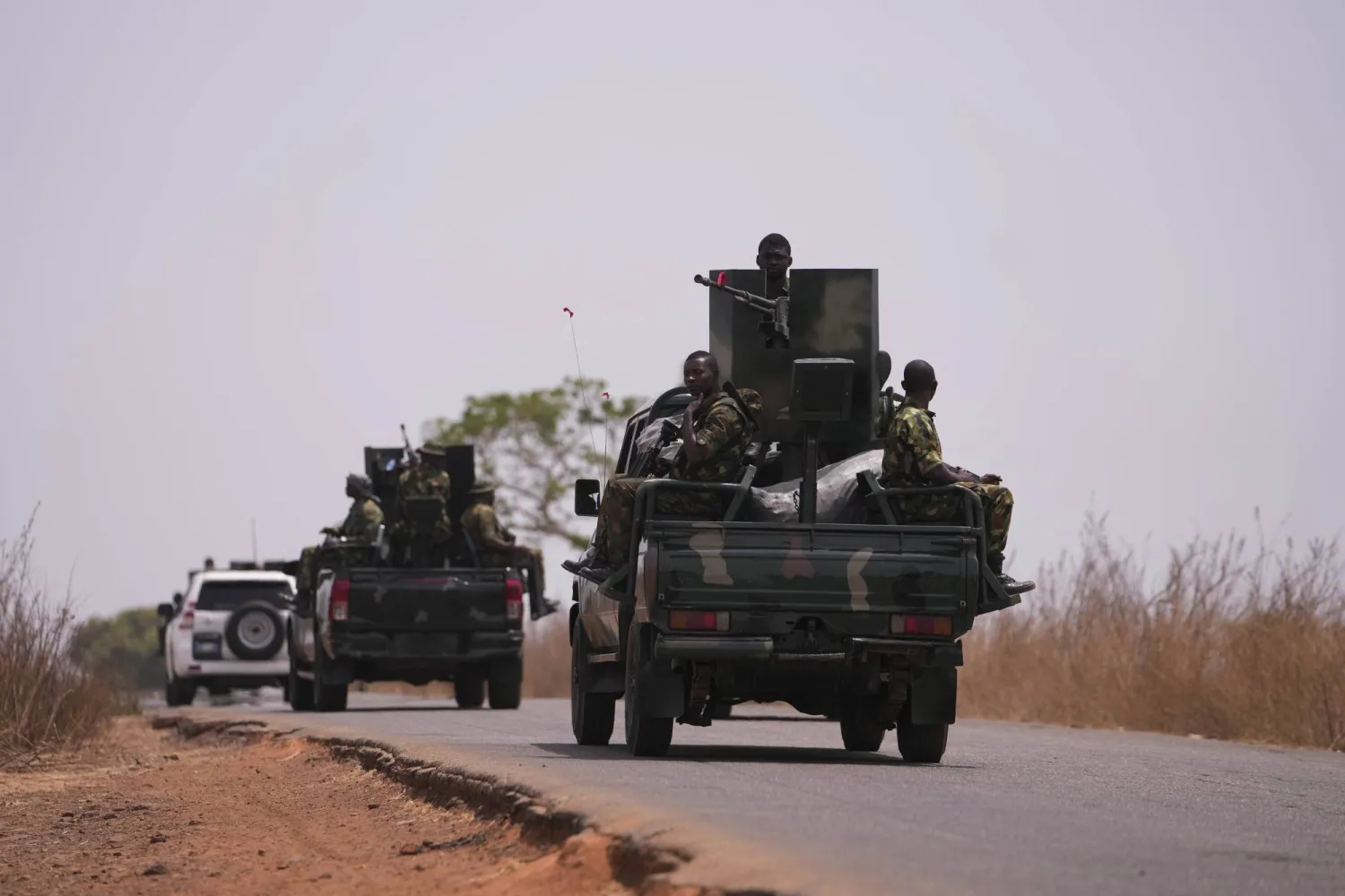 FILE - Nigerian army patrol near LEA Primary and Secondary School Kuriga where students were kidnapped in Kuriga, Kaduna, Nigeria, on March 9, 2024. (AP Photo/Sunday Alamba, File)