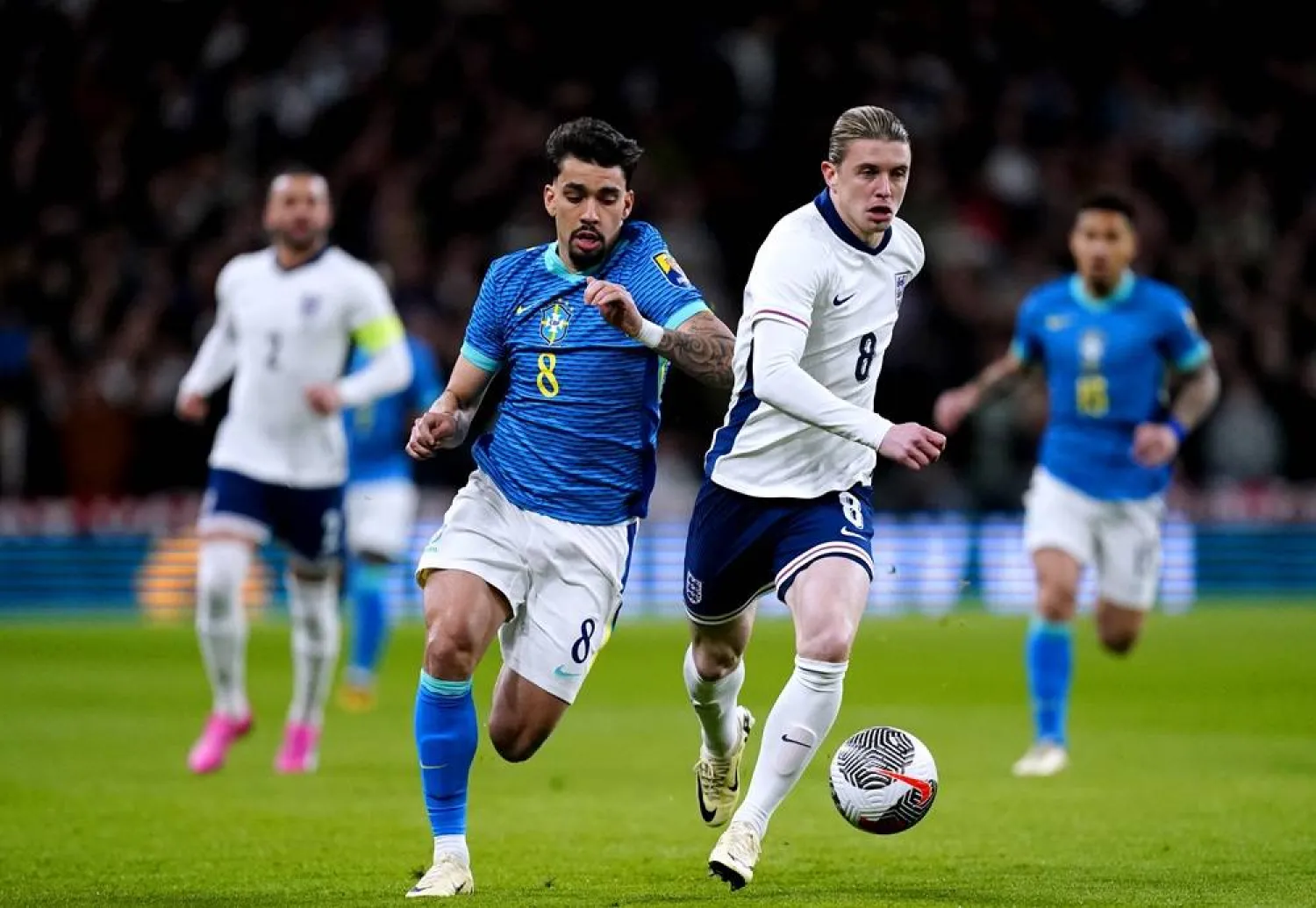 23 March 2024, United Kingdom, London: Brazil's Lucas Paqueta (L) and England's Conor Gallagher battle for the ball during the international friendly soccer match between England and Brazil at Wembley Stadium. (dpa)
