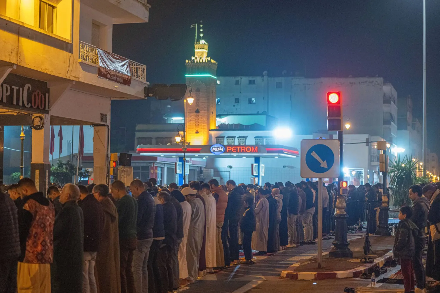 Moroccan Muslims perform an evening prayer called 'Tarawih' on a street during the holy fasting month of Ramadan in Rabat, Morocco, 16 March 2024. EPA/JALAL MORCHIDI