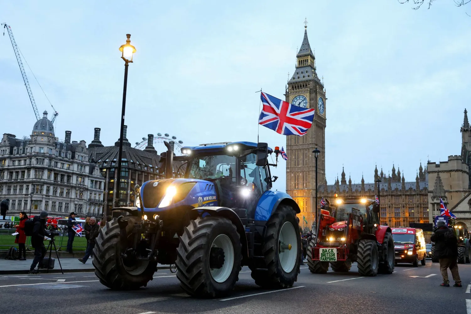 Farmers drive tractors through central London to protest against issues including food imports, as part of demonstrations from growers around the world, in London, Britain, March 25, 2024. REUTERS/Toby Melville  