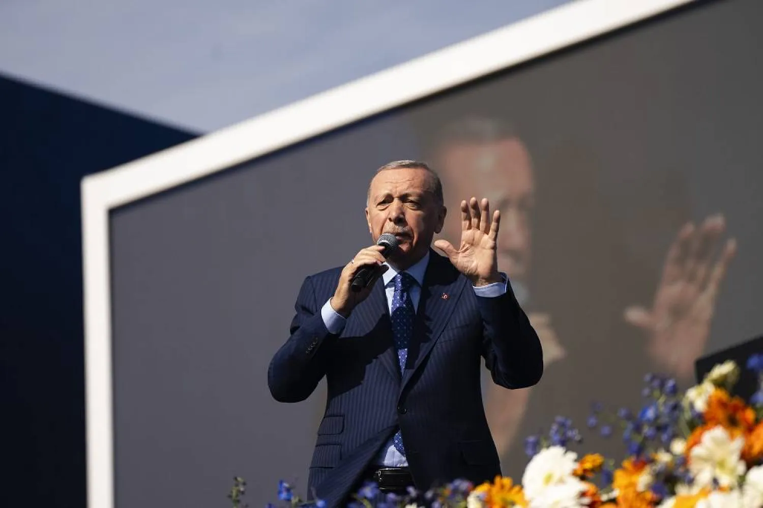 Turkish President and leader of the Justice and Development Party, or AKP, Recep Tayyip Erdogan gives a speech during a campaign rally ahead of nationwide municipality elections, in Istanbul, Türkiye, Sunday, March 24, 2024. (AP)