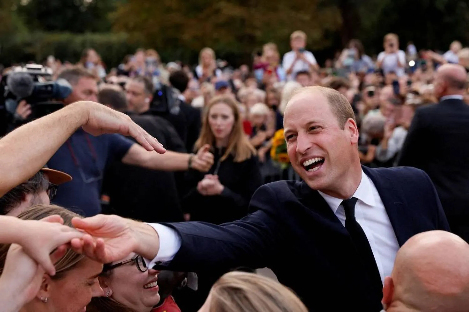 Britain's William, Prince of Wales, greets people outside Windsor Castle, following the death of Britain's Queen Elizabeth, in Windsor, Britain, September 10, 2022. (Reuters)