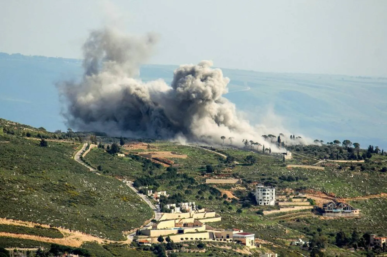 Smoke billows from the area of an Israeli air strike on the southern Lebanese village of Khiam near the border with Israel on March 23, 2024, amid ongoing cross-border tensions as fighting continues between Israel and Hamas in the Gaza Strip. (AFP) 