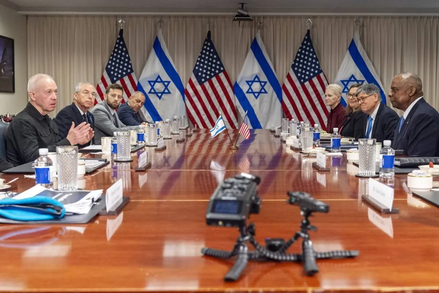  Israeli Defense Minister Yoav Gallant, at far left, speaks while meeting with Defense Secretary Lloyd Austin, across table at far right, at the Pentagon, Tuesday, March 26, 2024, in Washington. (AP)
