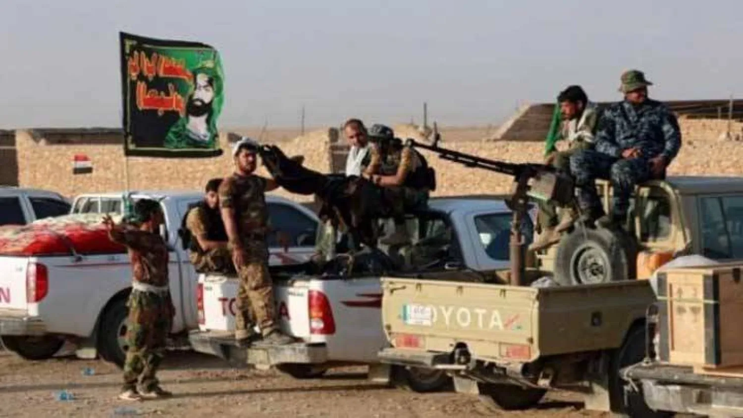 صورة أرشيفية لمجموعة من الميليشيات التابعة لإيران في دير الزور (المرصد السوري)