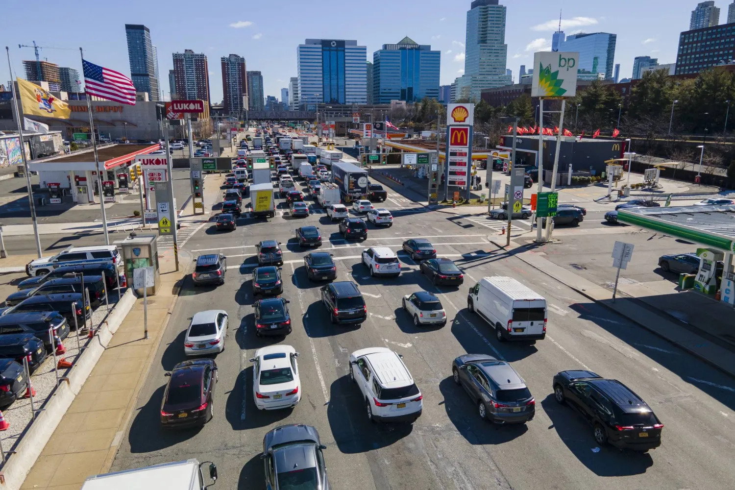 FILE - Commuters wait to drive through the Holland Tunnel into New York City during morning rush hour traffic in Jersey City, N.J., on Wednesday, March 8, 2023. (AP Photo/Ted Shaffrey, File)