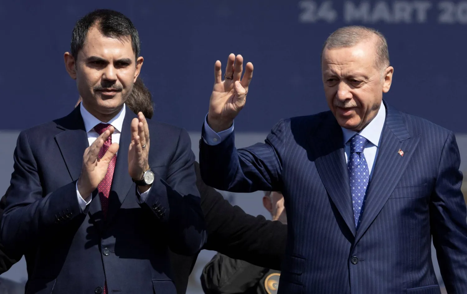Türkiye's President Tayyip Erdogan and Murat Kurum, mayoral candidate of his ruling AK Party (AKP), greet their supporters during a rally ahead of the local elections in Istanbul, Turkey March 24, 2024. REUTERS/Umit Bektas