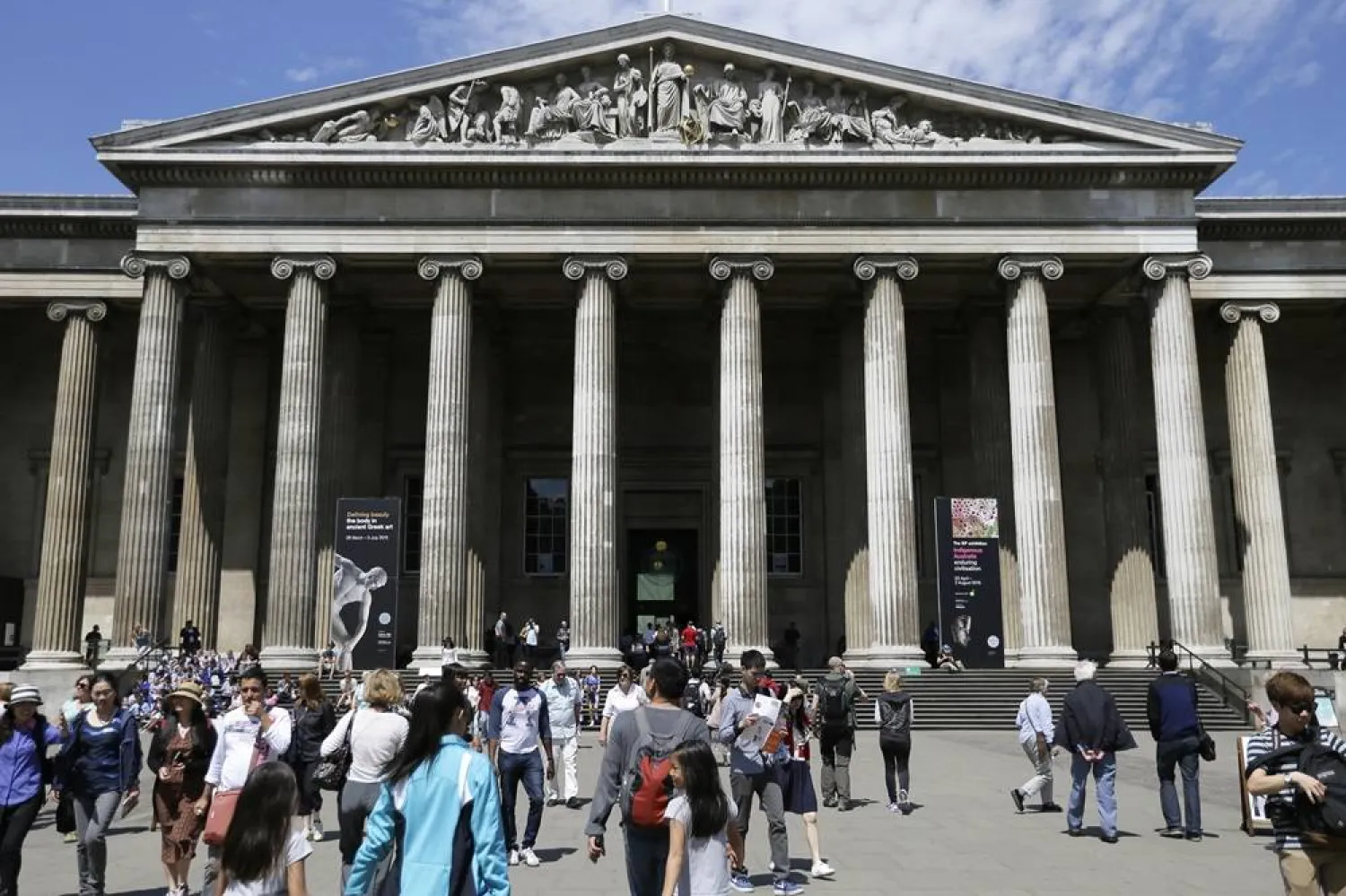Visitors walk outside the British Museum in Bloomsbury, London, Friday, June 26, 2015. (AP)