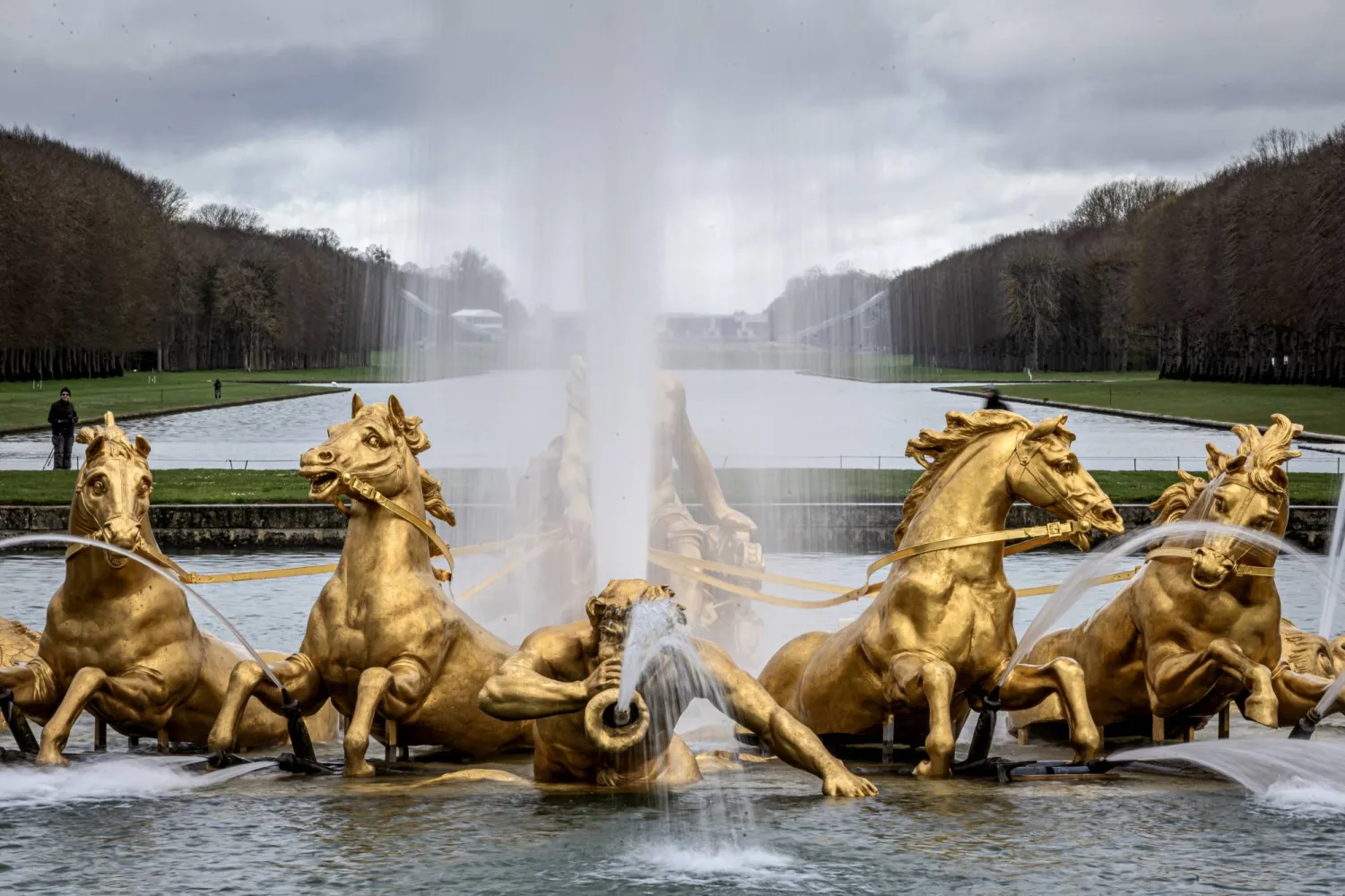 The sculptural fountain 'The Apollo Basin' by French sculptor Jean-Baptiste Tuby is seen at the end of restoration works in the Gardens of the Chateau de Versailles, west of Paris, France, 29 March 2024.  EPA/CHRISTOPHE PETIT TESSON