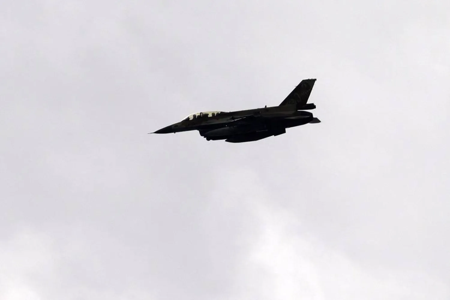 This picture taken from northern Israel shows an Israeli Air Force fighter jet flying over the border area with south Lebanon on March 27, 2024. (AFP)
