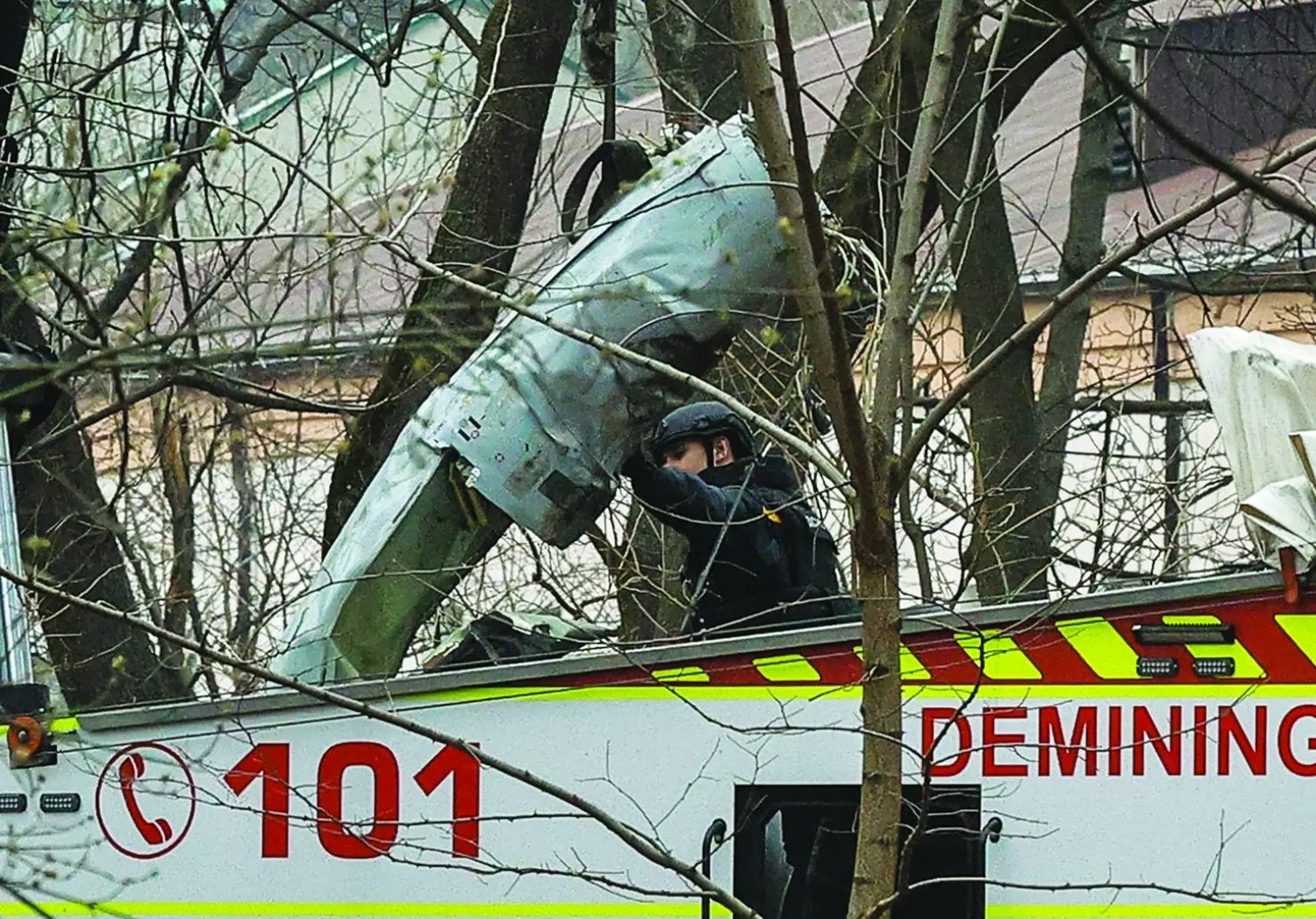 Ukrainian rescuers remove debris of a missile after it was shot down in a park in Kyiv, Ukraine, 24 March 2024, amid the Russian invasion. EPA/SERGEY DOLZHENKO