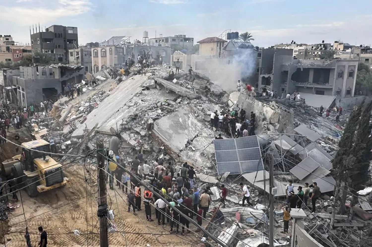 Palestinians look for survivors following Israeli airstrike in Nusseirat refugee camp, Gaza Strip, Tuesday, Oct. 31, 2023. (AP)