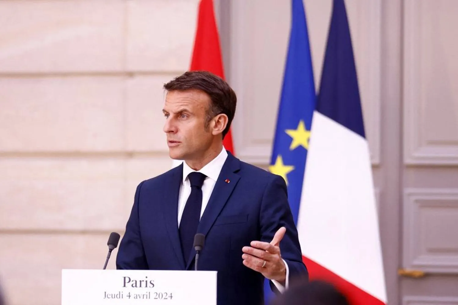  French President Emmanuel Macron delivers a speech during a press conference with Austrian Chancellor Karl Nehammer (not pictured) before their working lunch at Elysee Palace in Paris, France, April 4, 2024. (Reuters)
