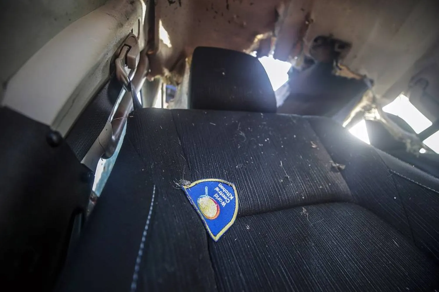 The interior of a destroyed car of the NGO World Central Kitchen (WCK) sitting along Al-Rashid road, between Deir Al-Balah and Khan Younis in the southern Gaza Strip, 02 April 2024. (EPA)
