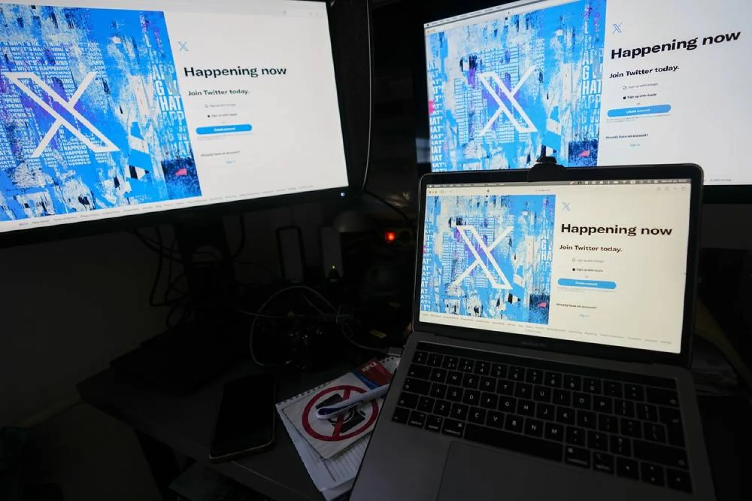 Computer monitors and a laptop display the X, formerly known as Twitter, sign-in page, July 24, 2023, in Belgrade, Serbia. (AP)