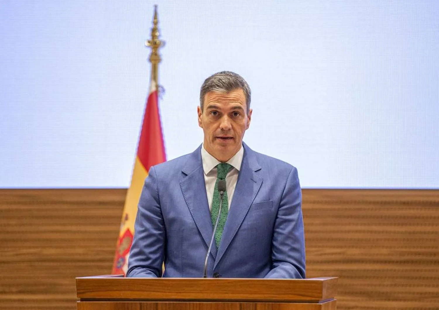 A  handout photo made available by the Qatar News Agency shows Spain's Prime Minister Pedro Sanchez during a joint press conference with Qatar's prime minister and foreign minister in Doha, Qatar, 03 April 2024. (EPA/ Qatar News Agency)