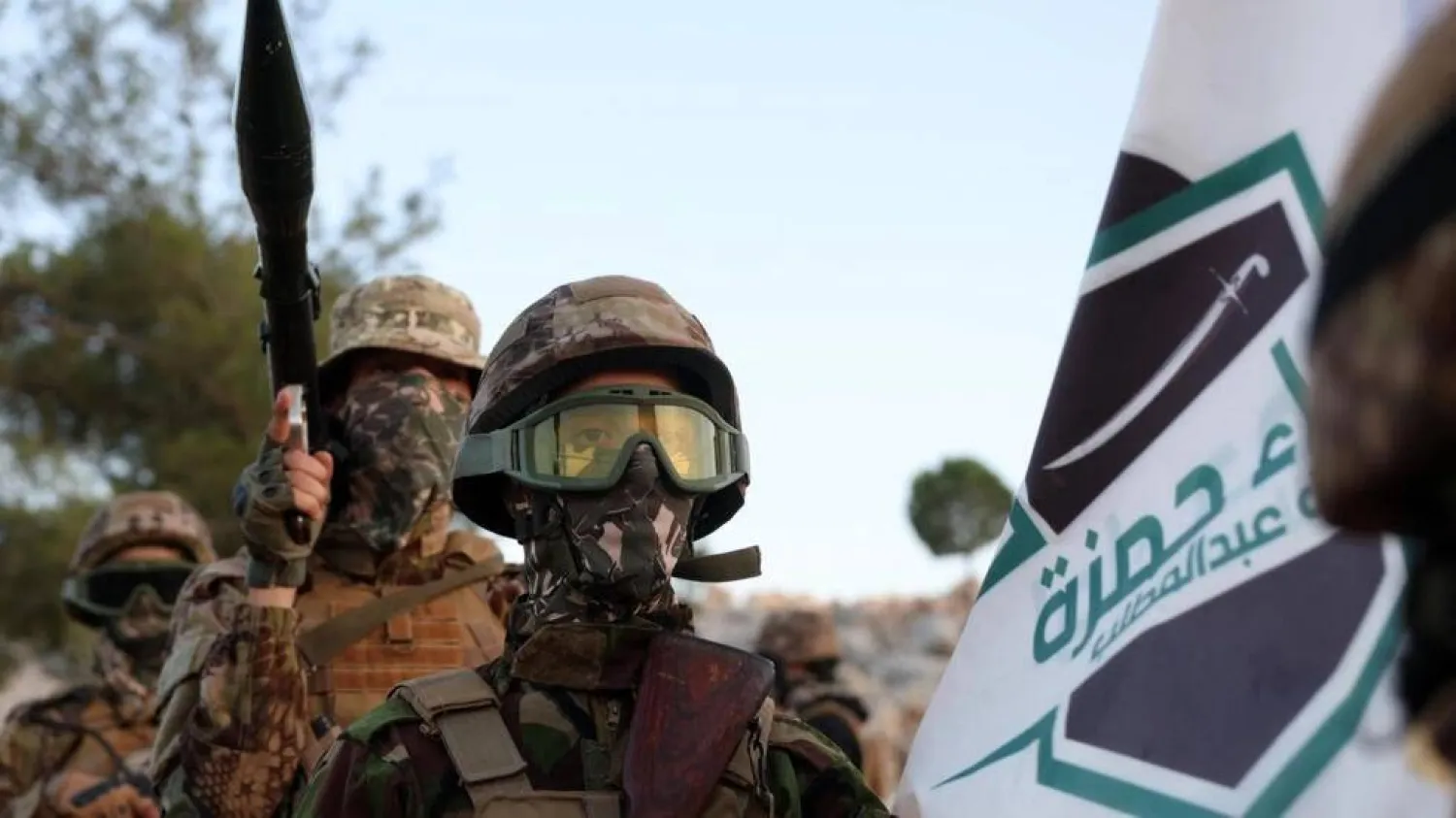 Fighters from the militant group Hayat Tahrir al-Sham (HTS), headed by ex-members of Syria's former Al-Qaeda franchise, on August 16, 2023. Omar Haj Kadour, AFP
