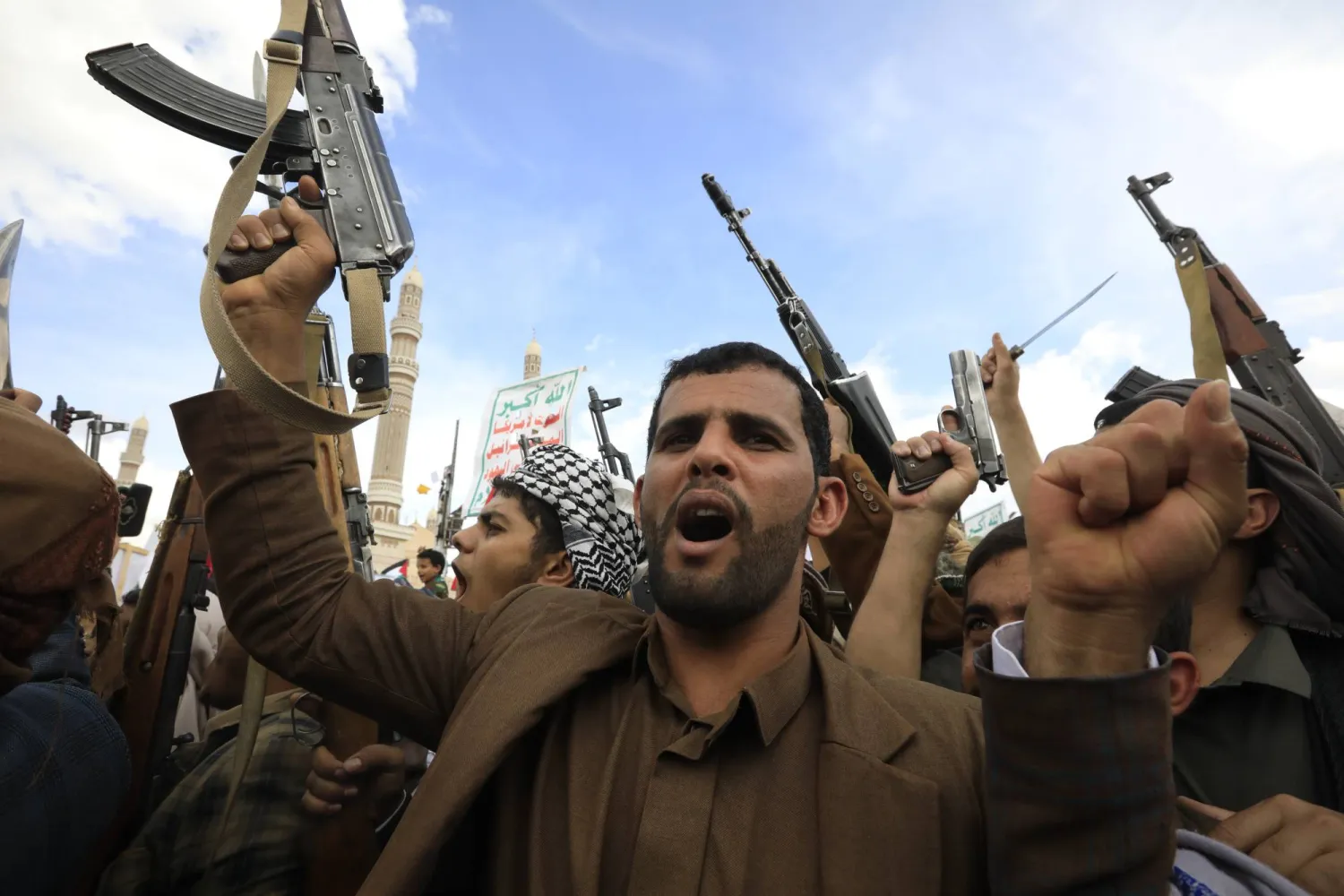 Houthi supporters hold up weapons during a rally marking the Al-Quds Day, in Sanaa, Yemen, 05 April 2024.  EPA/YAHYA ARHAB