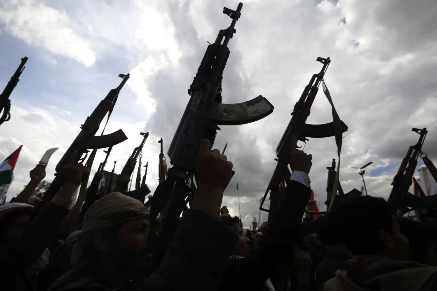 Houthi supporters hold up weapons during a rally marking the Al-Quds Day, in Sanaa, Yemen, 05 April 2024. EPA/YAHYA ARHAB