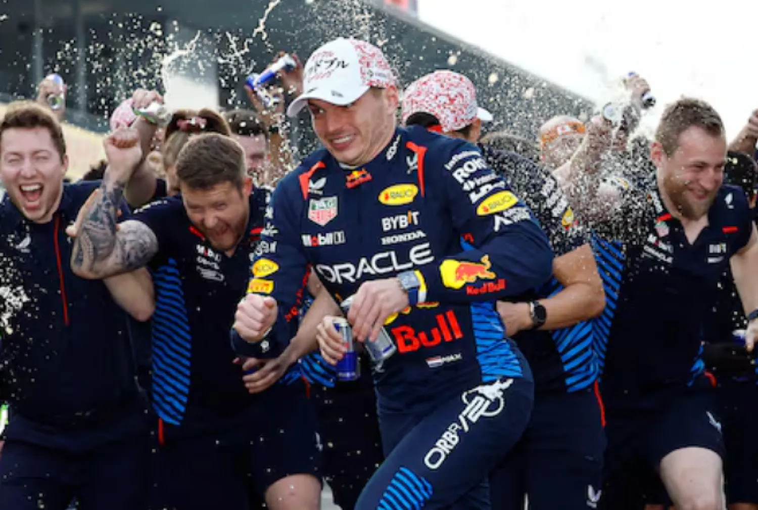 Formula One F1 - Japanese Grand Prix - Suzuka Circuit, Suzuka, Japan - April 7, 2024 Red Bull's Max Verstappen celebrates with his team after winning the Japanese Grand Prix REUTERS/Issei Kato TPX IMAGES OF THE DAY Purchase Licensing Rights