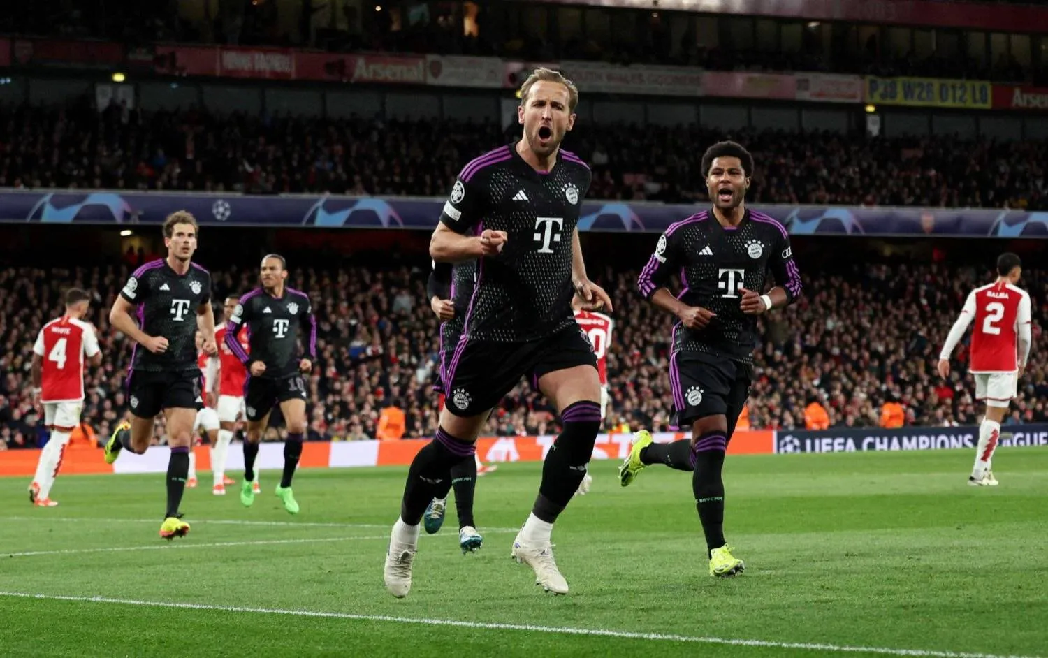Harry Kane celebrates his goal at Arsenal. The striker has no regrets over his move to Bayern – ‘I’m really enjoying it,’ he said. Photograph: David Klein/Reuters