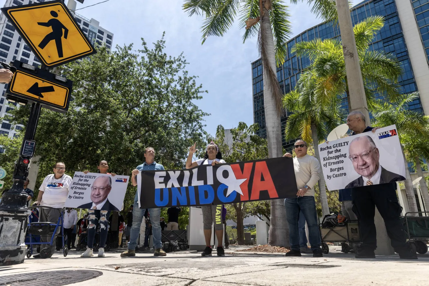 People gather in front of the James Lawrence King Federal Justice Building where the trial of the former US diplomat who served as US ambassador to Bolivia, Victor Manuel Rocha, is being held, in Miami, Florida, USA, 12 April 2024. EPA/CRISTOBAL HERRERA-ULASHKEVICH