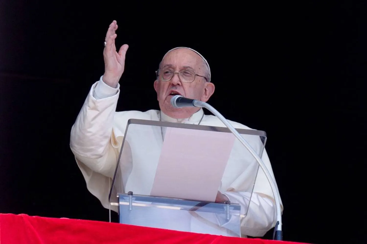  Pope Francis leads the Regina Caeli prayer from his window at the Vatican, April 14, 2024. (Vatican Media/­Handout via Reuters)