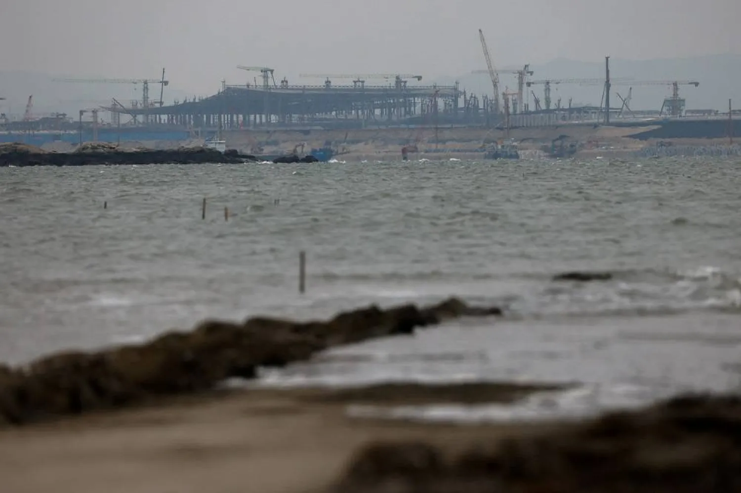 Construction of Xiang'an International Airport in China's Xiamen as seen from Kinmen, Taiwan December 20, 2023. (Reuters)