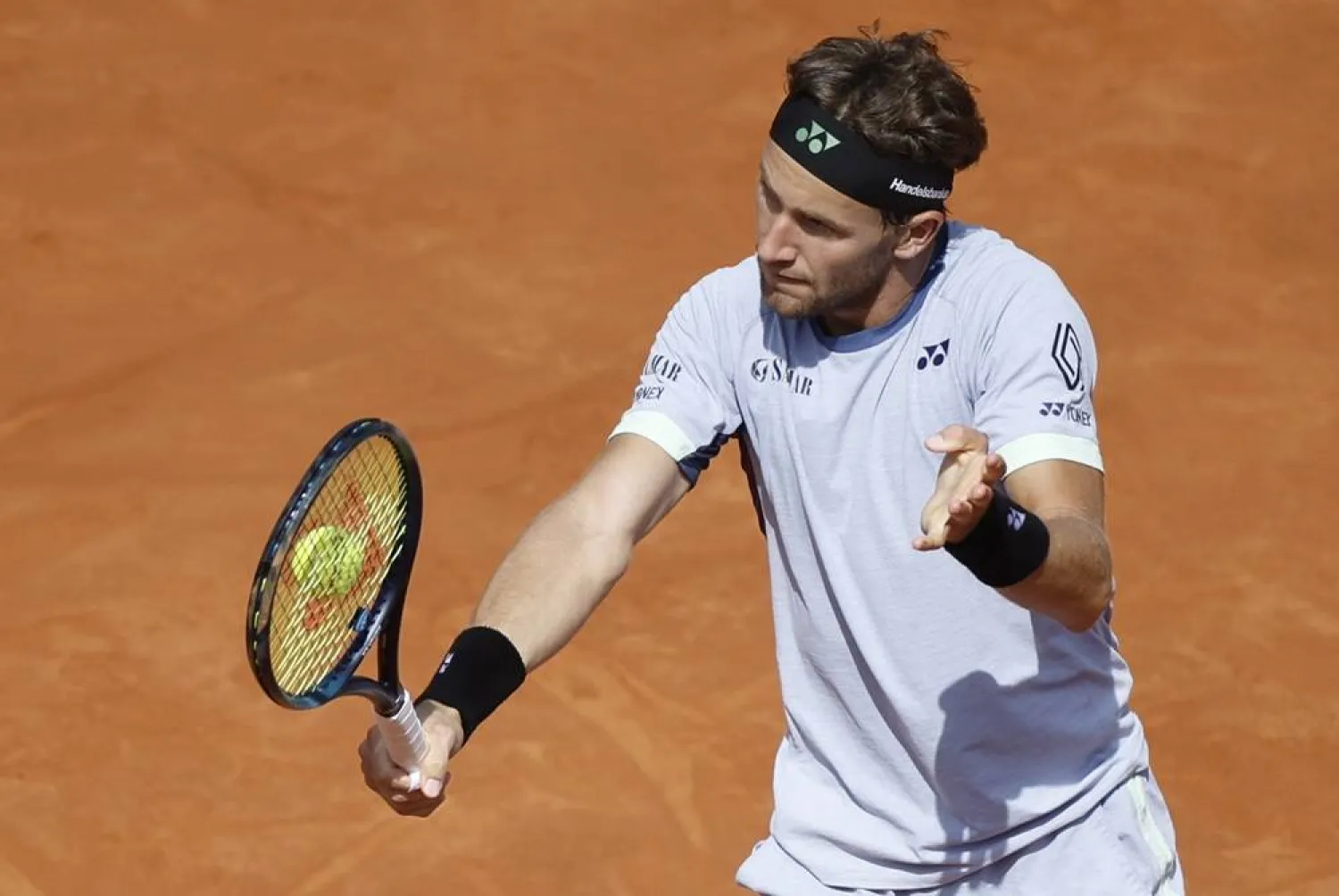 Casper Ruud of Norway in action during his semifinal match against Tomas Etcheverry of Argentina at the ATP Barcelona Open tennis tournament held in Barcelona, Spain, 20 April 2024. (EPA)