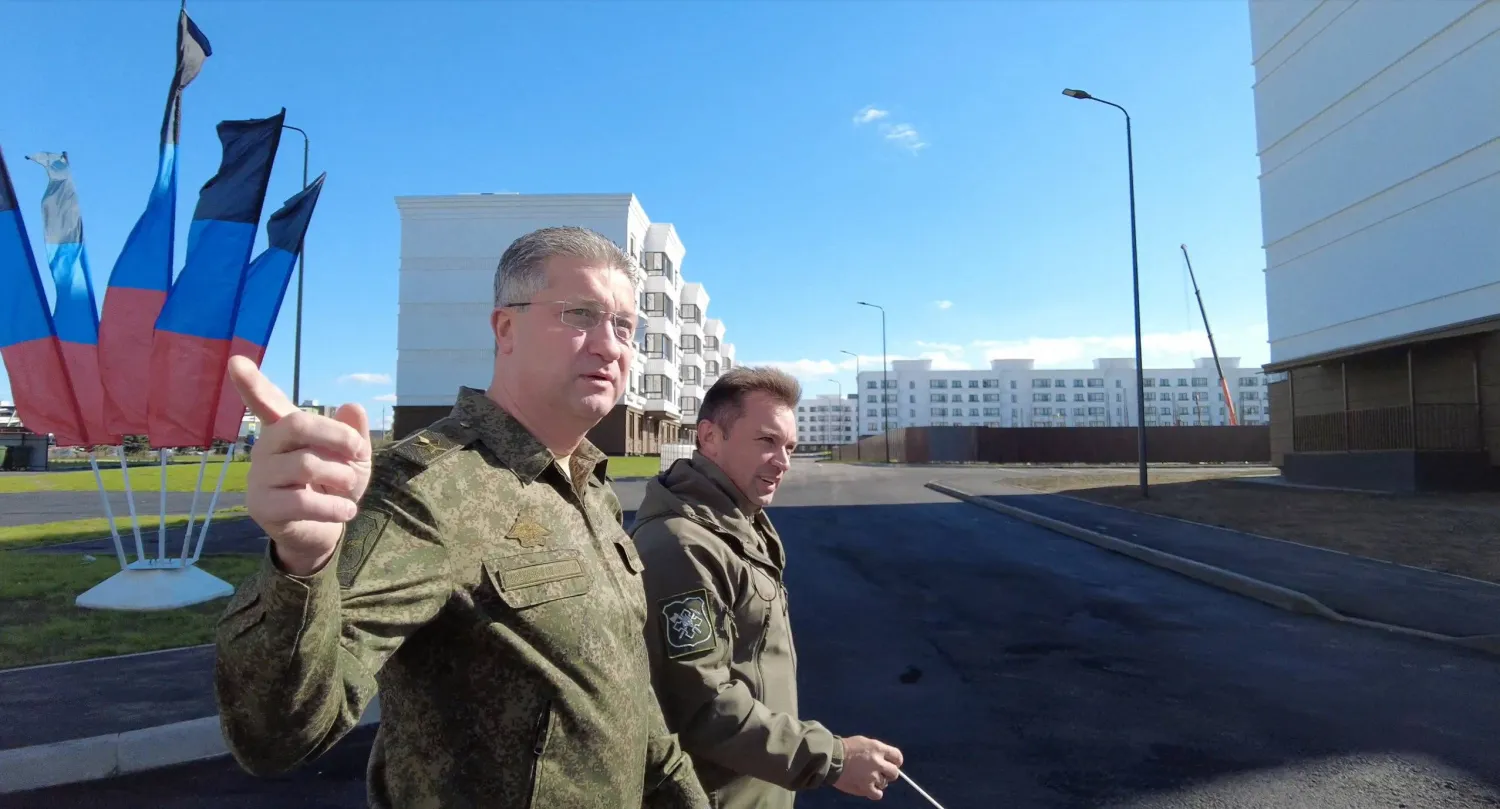 Russian Deputy Defense Minister Timur Ivanov inspects the construction of apartment blocks in Mariupol, Russian-controlled Ukraine, in this still image from video released October 15, 2022. Russian Defence Ministry/Handout via REUTERS