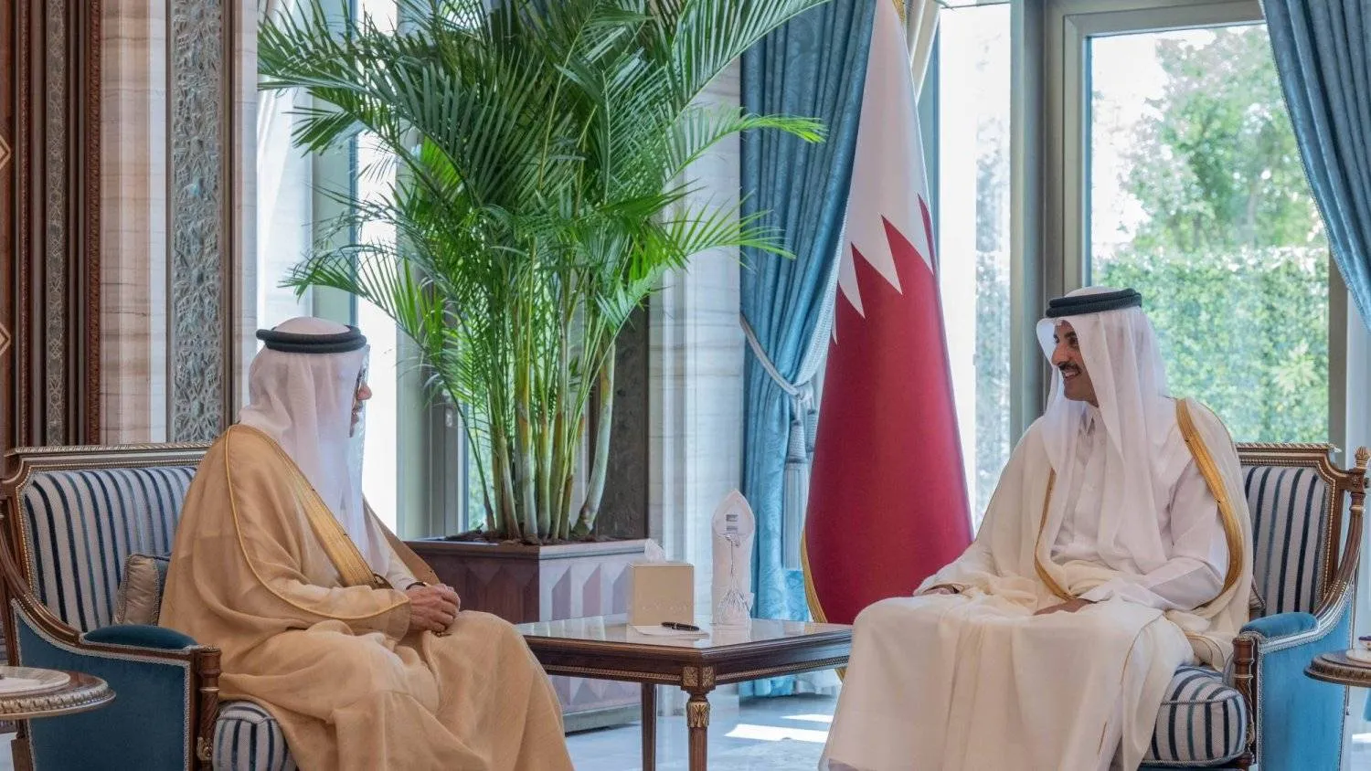 Emir of Qatar Sheikh Tamim bin Hamad Al-Thani meets with Bahrain’s Foreign Minister Abdullatif bin Rashid al-Zayani in Doha on Thursday. (Qatar News Agency)
